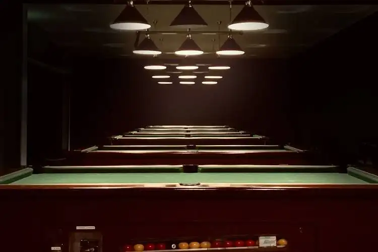 red and black train in a tunnel