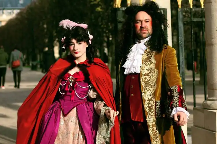 man and woman in character dresses