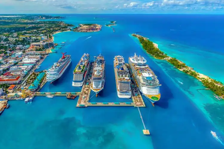 aerial photography of white and blue cruise ships during daytime