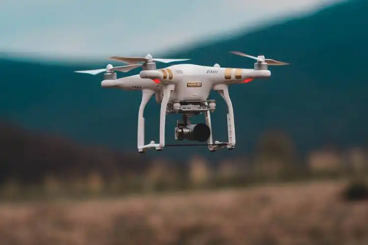 selective focus photography of DJI Phantom 3 Professional quadcopter drone