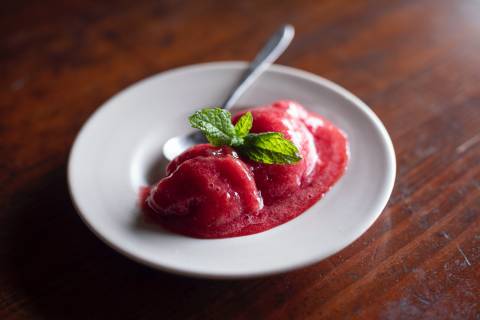 strawberry on white ceramic plate