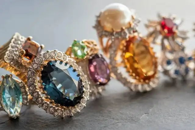 gold and green gemstone ring