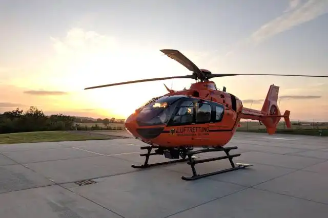 closeup photo of orange and black helicopter