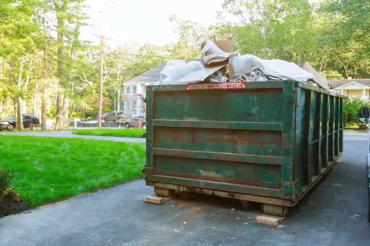 Dumpsters being full with garbage container Over flowing