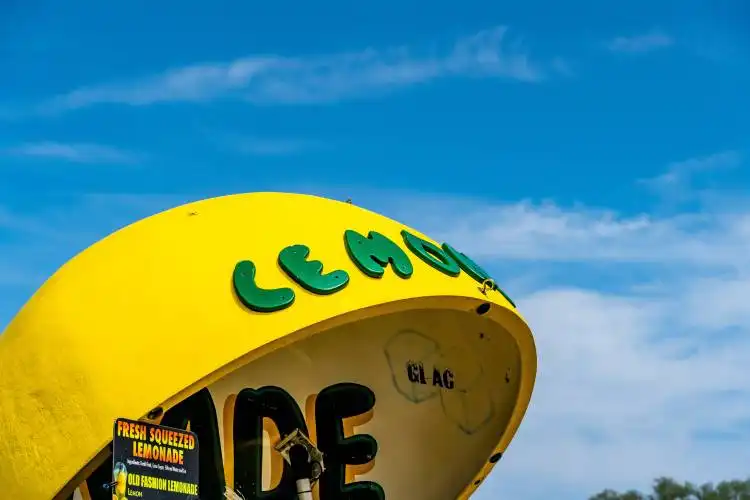 a yellow balloon with green text