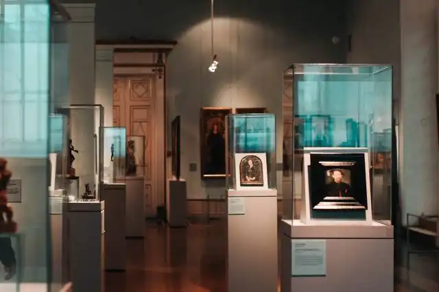 a museum filled with lots of glass cases