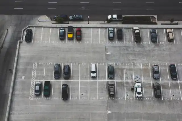 aerial view of cars parked on parking lot