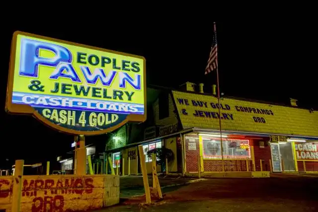 people's pawn and jewelry store at night