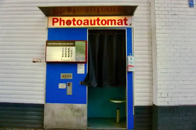 a blue door with a black curtain on it