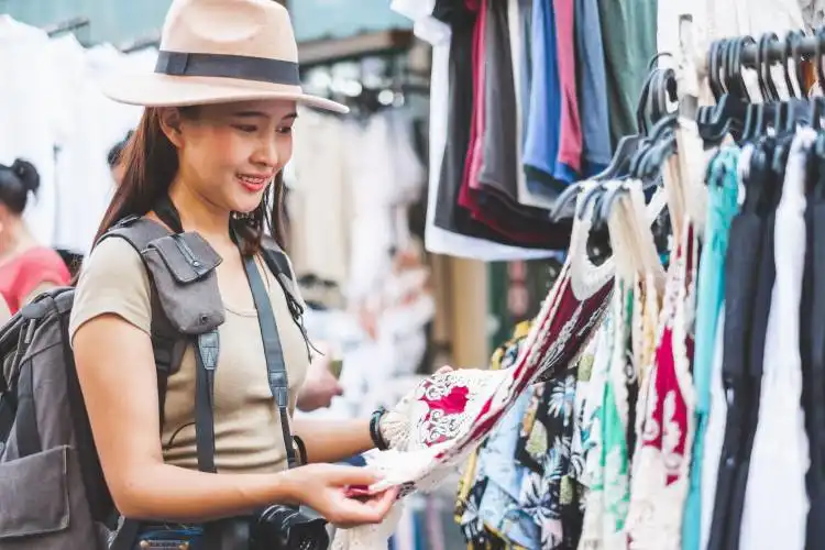 Asian traveler/tourist walking and travelling in Khao San rd. walk street, Bangkok, Thailand