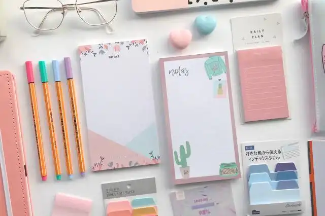 white printer paper with assorted color pencils