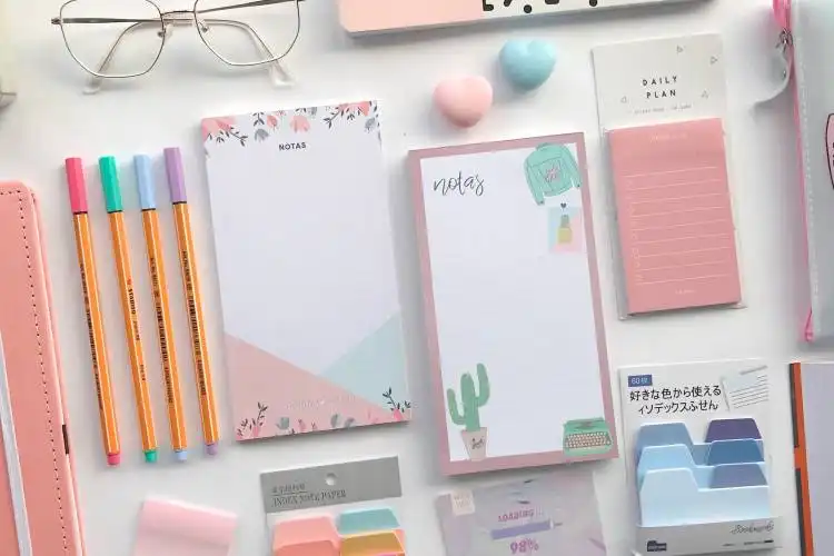 white printer paper with assorted color pencils