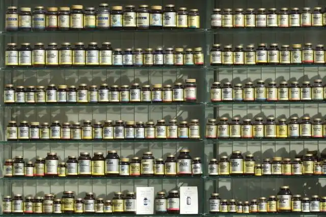 assorted labeled bottle on display shelf