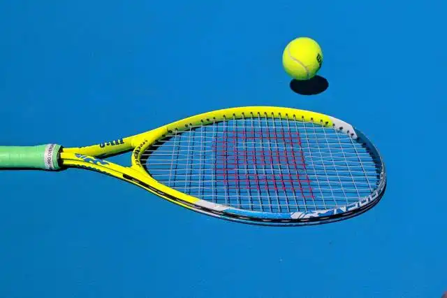 yellow Wilson tennis racket