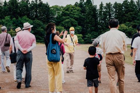 people walking on brown dirt road during daytime