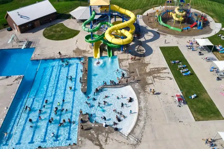 green inflatable ring on blue plastic table
