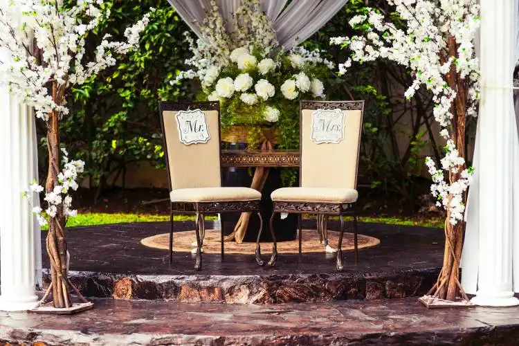 two black steel chairs beside table