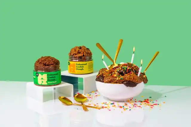 three chocolate ice cream cups on white ceramic plate